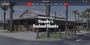 Stewby's Seafood Shanty restaurant exterior with palm trees